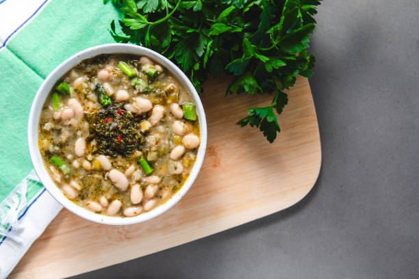 istock White bean soup on wooden cutting board 2177860722