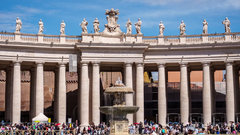 Time lapse of tourists on Vatican square. Some tourists walk around and take a shoot, some tourists staying in line to Basilica di San Pietro.