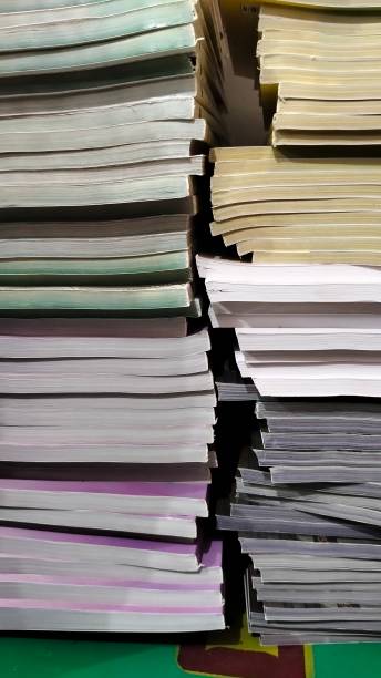 istock two neat stacks of books 2177874074