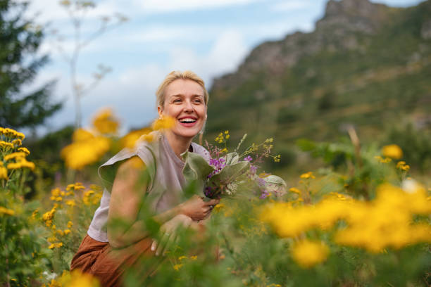 Joyful Woman Enjoying Nature in Serene Meadow Setting