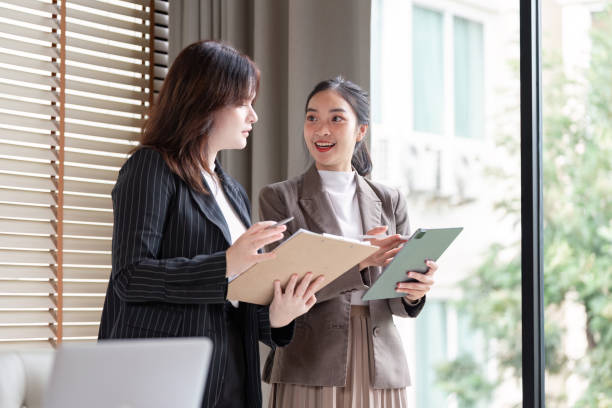 istock Professional Team Collaborating with Digital and Paper Tools in Office 2177880458