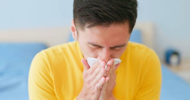 istock Asian male sneeze bad air 2177881290