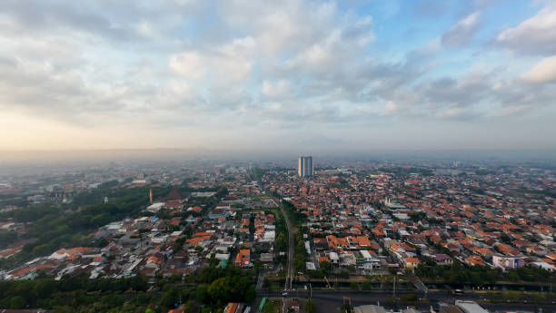 istock A cityscape with a cloudy sky and tall buildings 2177887768
