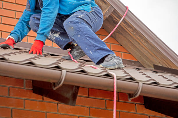 istock worker preparing before installing solar panels on the roof. Saving energy resources of the earth 2177889938
