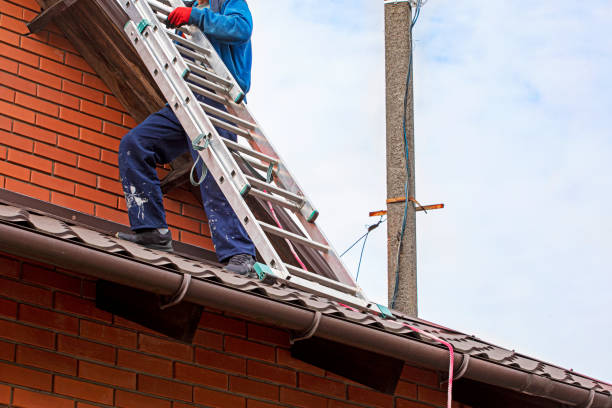 istock worker preparing before installing solar panels on the roof. Saving energy resources of the earth 2177889941