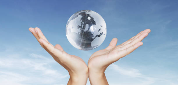 istock Glass globe in hand,Energy saving concept 2177891447