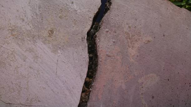 istock crack or damaged crack white wall 2177892175