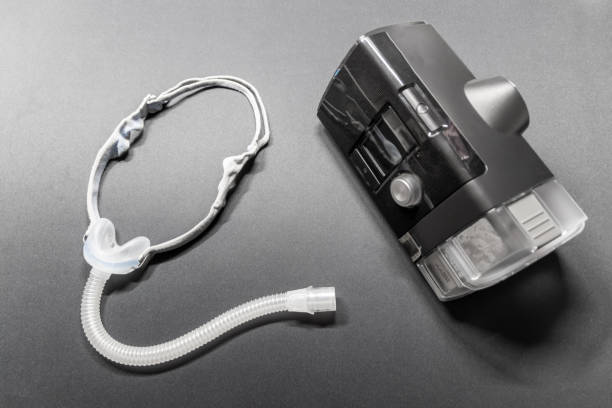 istock CPAP mask with nose mask or full face mask cpap machine against obstructive sleep apnea helps patients as respirator mask headgear clip for breathing medication in snoring sleep disorder breath easier 2177897791