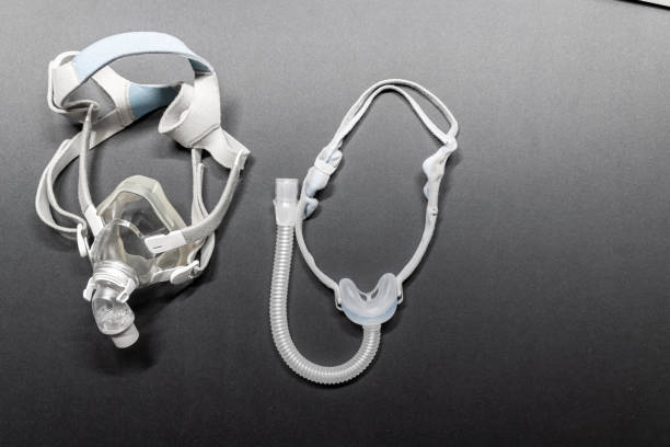 istock CPAP mask with nose mask or full face mask cpap machine against obstructive sleep apnea helps patients as respirator mask headgear clip for breathing medication in snoring sleep disorder breath easier 2177898085