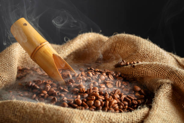 istock Fresh roasted coffee beans in burlap bag. 2177900816