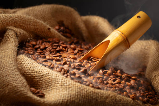 istock Fresh roasted coffee beans in burlap bag. 2177900817