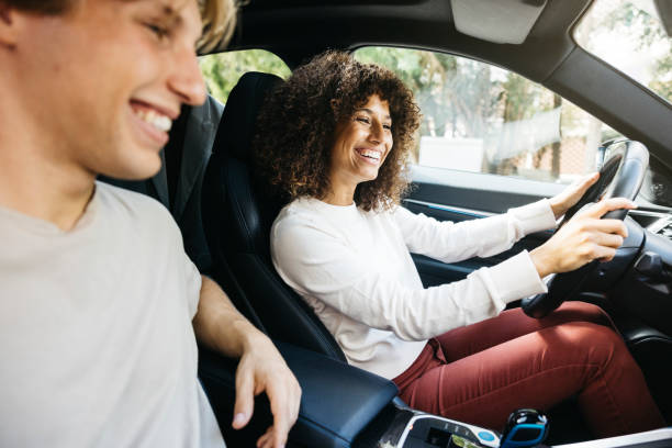 istock Young couple together in a car. 2177901124