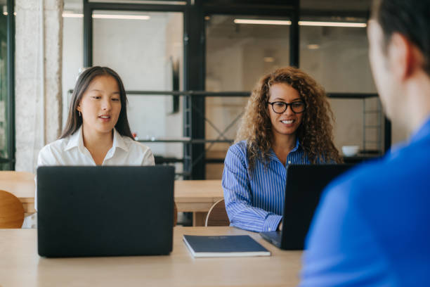 istock Multicultural businesspeople working in a modern an office 2177902071