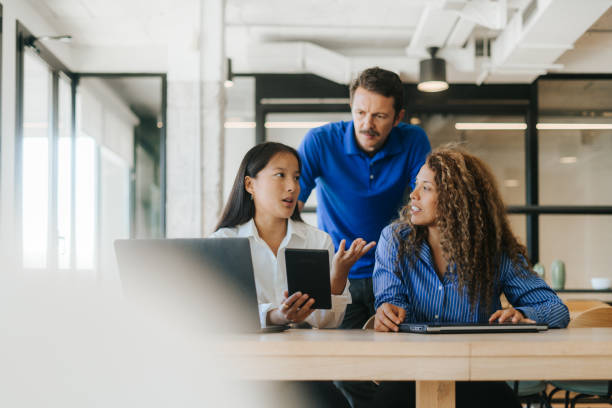 istock Multicultural businesspeople working in a modern an office 2177902167
