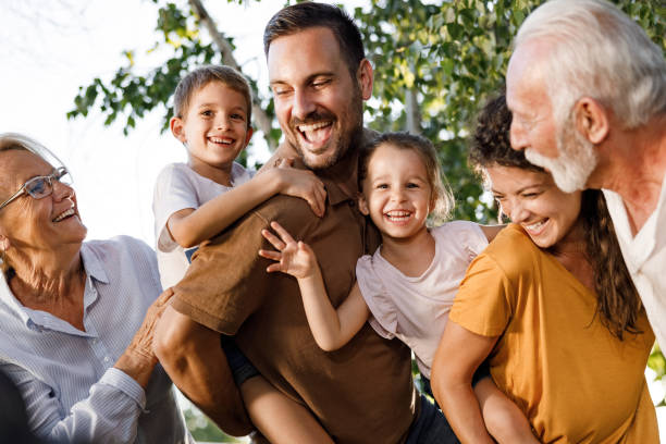 istock Cheerful extended family having fun in nature. 2177906989
