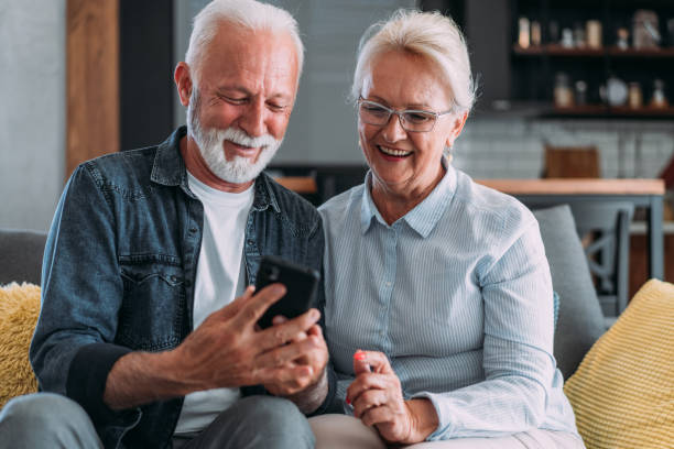 istock Couple making video call on smartphone at home. 2177908572