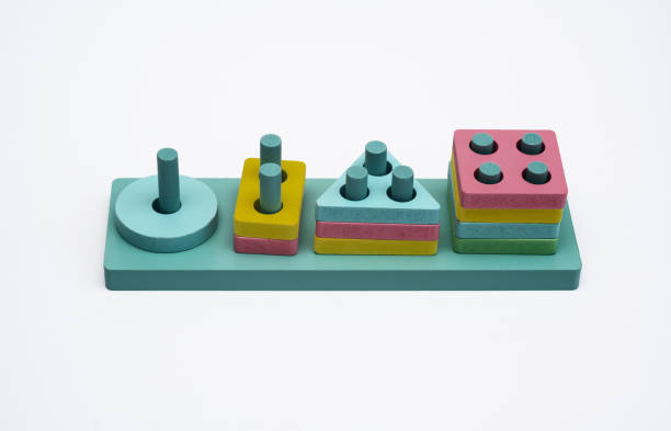 istock A puzzle game for kids. Montessori for children's development. multicolored geometric shapes - square, circle, triangle, quadrilateral. on a white background. 2177910149