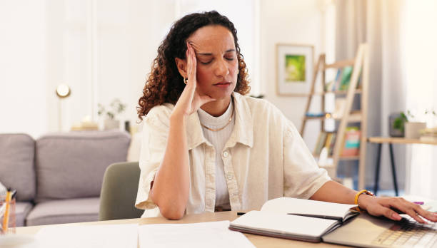 istock Remote work, businesswoman and headache with laptop for solution, information and network glitch. Freelancer, female person and web designer with stress for online page, tired and migraine at home 2177910818