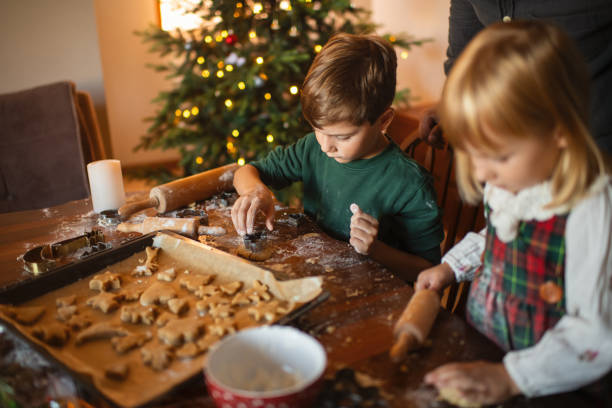 istock Children making Christmas cookies at home 2177911048