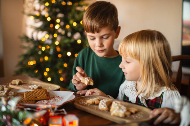 istock Children making Christmas cookies at home 2177911233