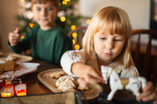 istock Children making Christmas cookies at home 2177911242