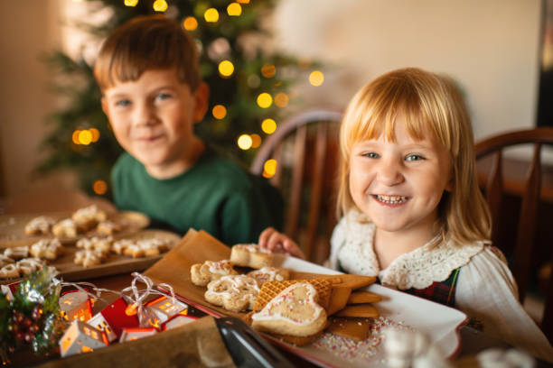 istock Children making Christmas cookies at home 2177911270