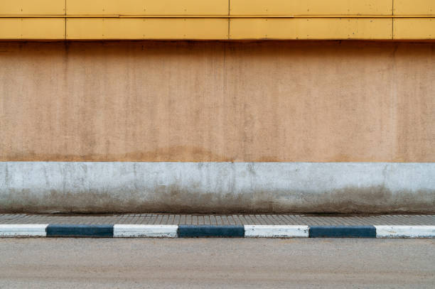 istock Empty street and wall building detail. 2177911332