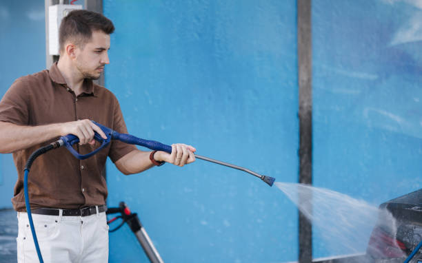 istock Car washing. Man using high pressure wax for shining. Last process 2177913840