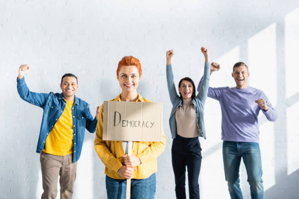 Multicultural citizens joyfully voting in a vibrant community election
