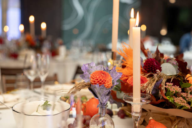istock Aesthetic stylish autumn table setting background, arranged flowers and candles under natural light. 2177915018