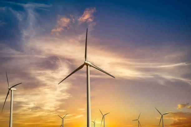 istock Wind turbines at sunset with a vibrant sky. 2177917892