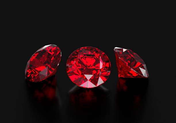 istock Dazzling diamond red gemstones on black background 2177925027