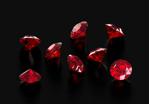 istock Dazzling diamond red gemstones on black background 2177925029