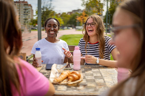 istock Laughter over breakfast time in public park 2177927638