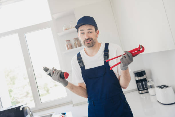 istock Confident handyman with tools ready for home renovation in modern kitchen interior 2177929507