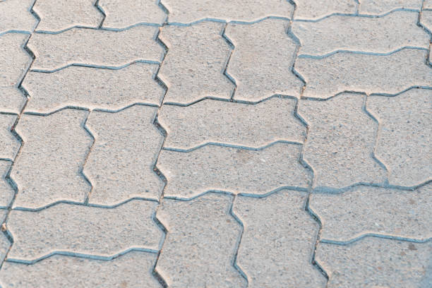 istock Elegant Texture of Interlocking Concrete Pavers in Soft Morning Light 2177935438