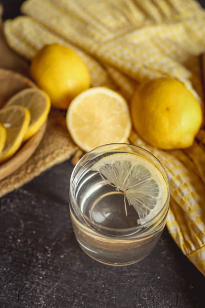 istock Cool freshly made lemonade in glass on wooden table. Space for text 2177938514