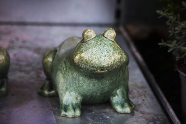 A green garden porcelain frog