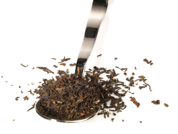 istock Dried black Tea on a Spoon - White Background 2177942080