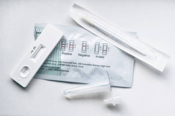 istock A home coronavirus test kit with a cassette, swab, and liquid. It is used for self-testing, providing a quick diagnostic or result for COVID-19 at home. 2177947585