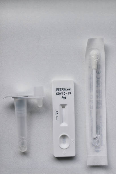 istock A home coronavirus test kit with a cassette, swab, and liquid. It is used for self-testing, providing a quick diagnostic or result for COVID-19 at home. 2177947669
