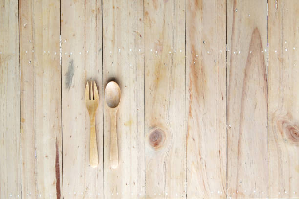 Wooden Utensils on Rustic Wooden Surface