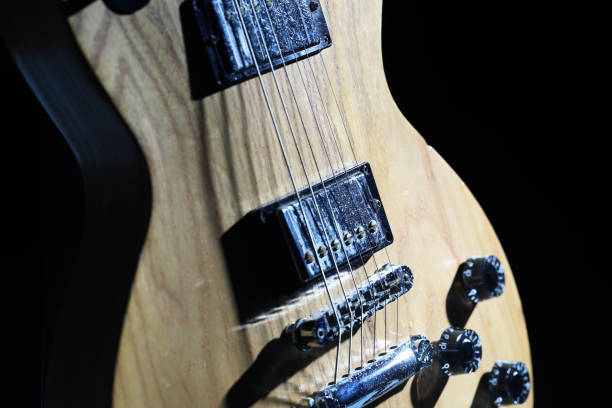 istock Close-Up of Guitar Body and Strings 2177949128