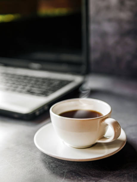 istock Relax during business work concept, americano coffee cup and black coffee cup aromatic and laptop computer in morning 2177950017
