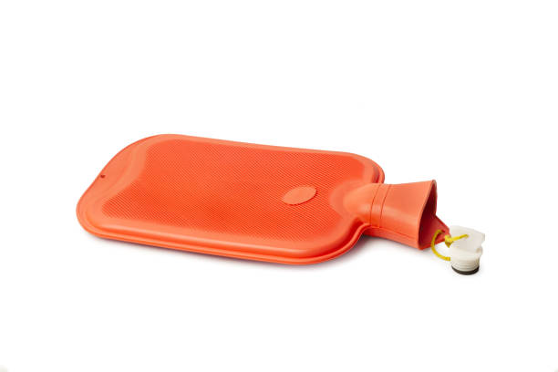 Classic rubber hot water bottle on a white background