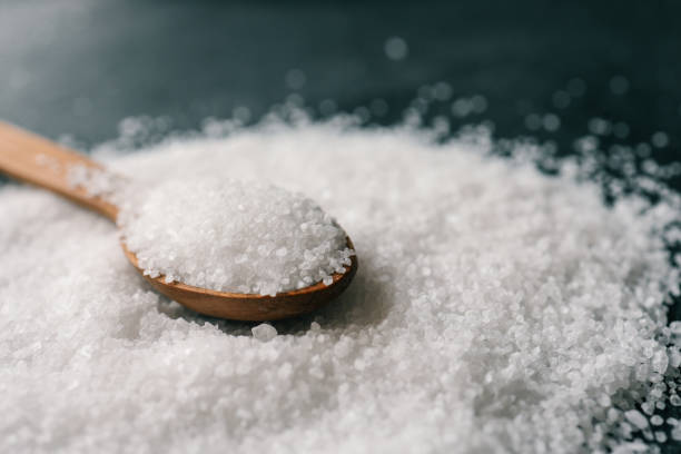 istock Wooden spoon with salt, close-up 2177952465