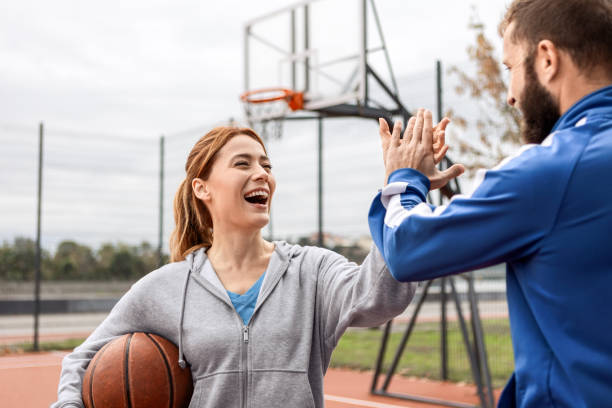 istock Young Couple Playing Basketball 2177955560