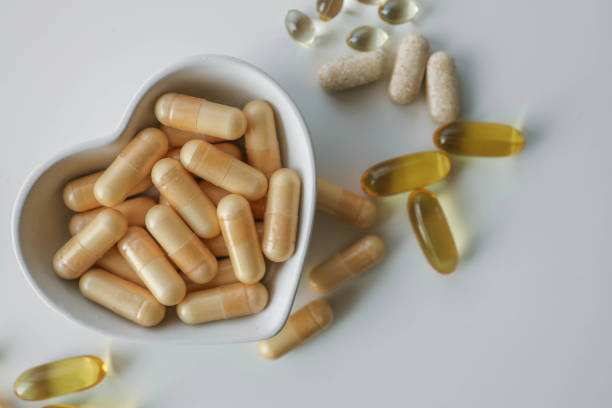 istock Tablets and vitamins on white background, banner advertising, pharmaceuticals 2177968019