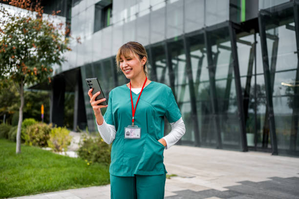 istock Female nurse using a mobile phone during a break 2177969477
