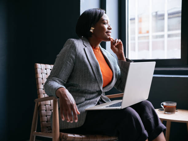 istock Professional Woman Enjoying Coffee Break in Modern Office 2177969722